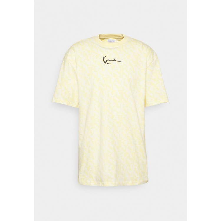 Kobiety T SHIRT TOP | Karl Kani SMALL SIGNATURE LOGO TEE UNISEX - T-shirt z nadrukiem - light yellow/jasnożółty - UU89528