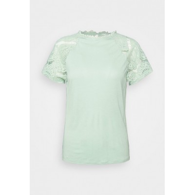 Kobiety T_SHIRT_TOP | NAF NAF OTHELLO - T-shirt z nadrukiem - vert tendre/jasnozielony - GJ49754