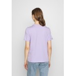 Kobiety T SHIRT TOP | Pieces PCRIA FOLD UP SOLID TEE - T-shirt basic - lavender/fioletowy - MW43358